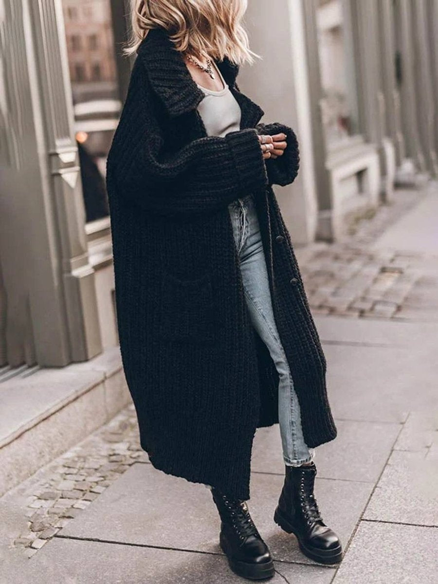 Ysabel — Jersey de punto largo oversized con cuello solapa y bolsillos
