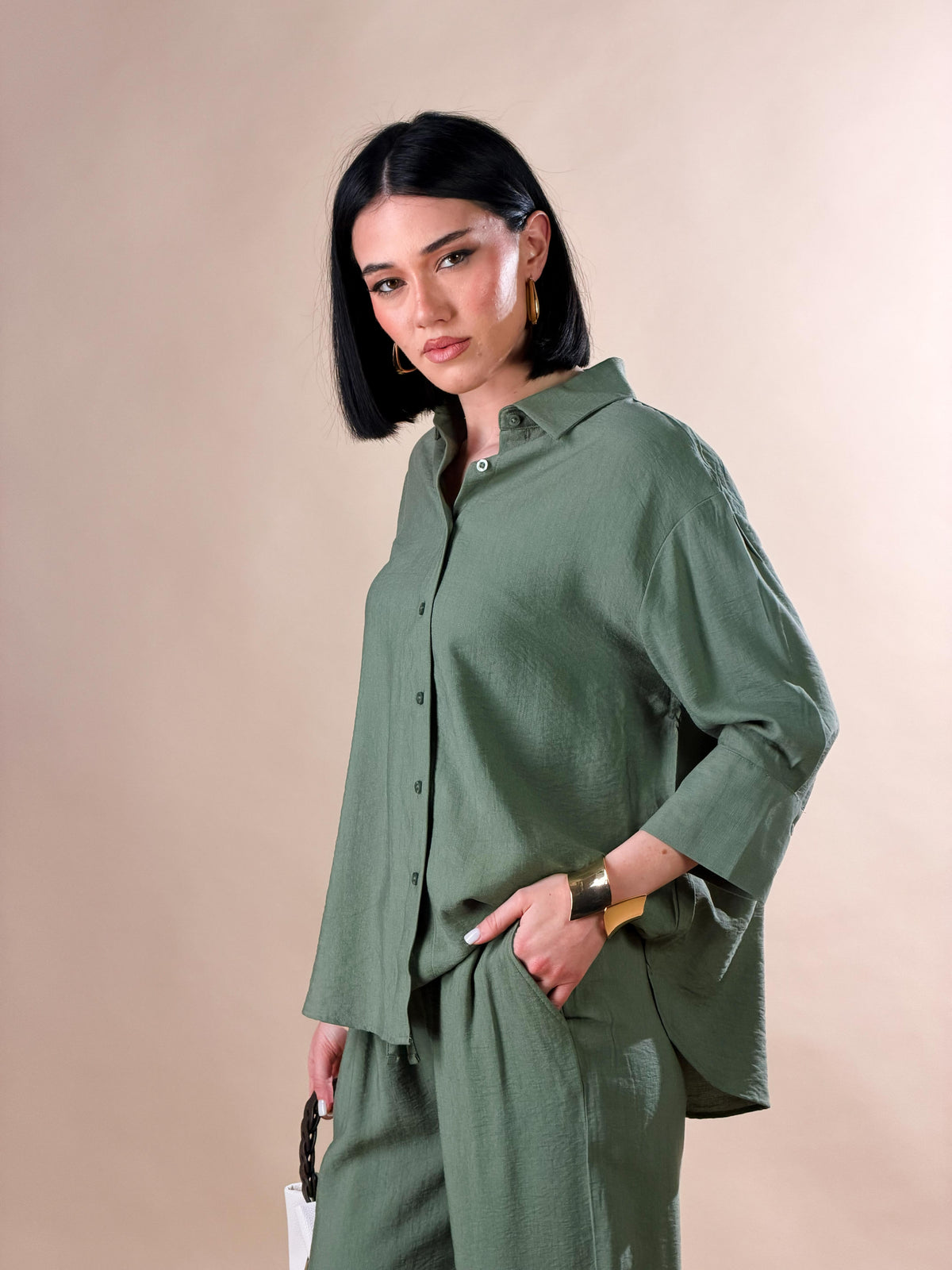 Celeste — Camisa con botones y mangas tres cuartos