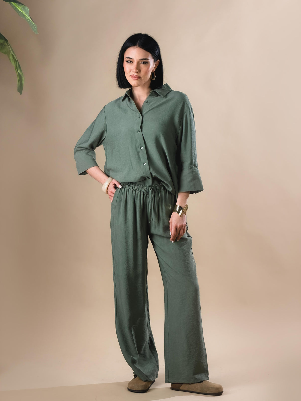 Celeste — Camisa con botones y mangas tres cuartos