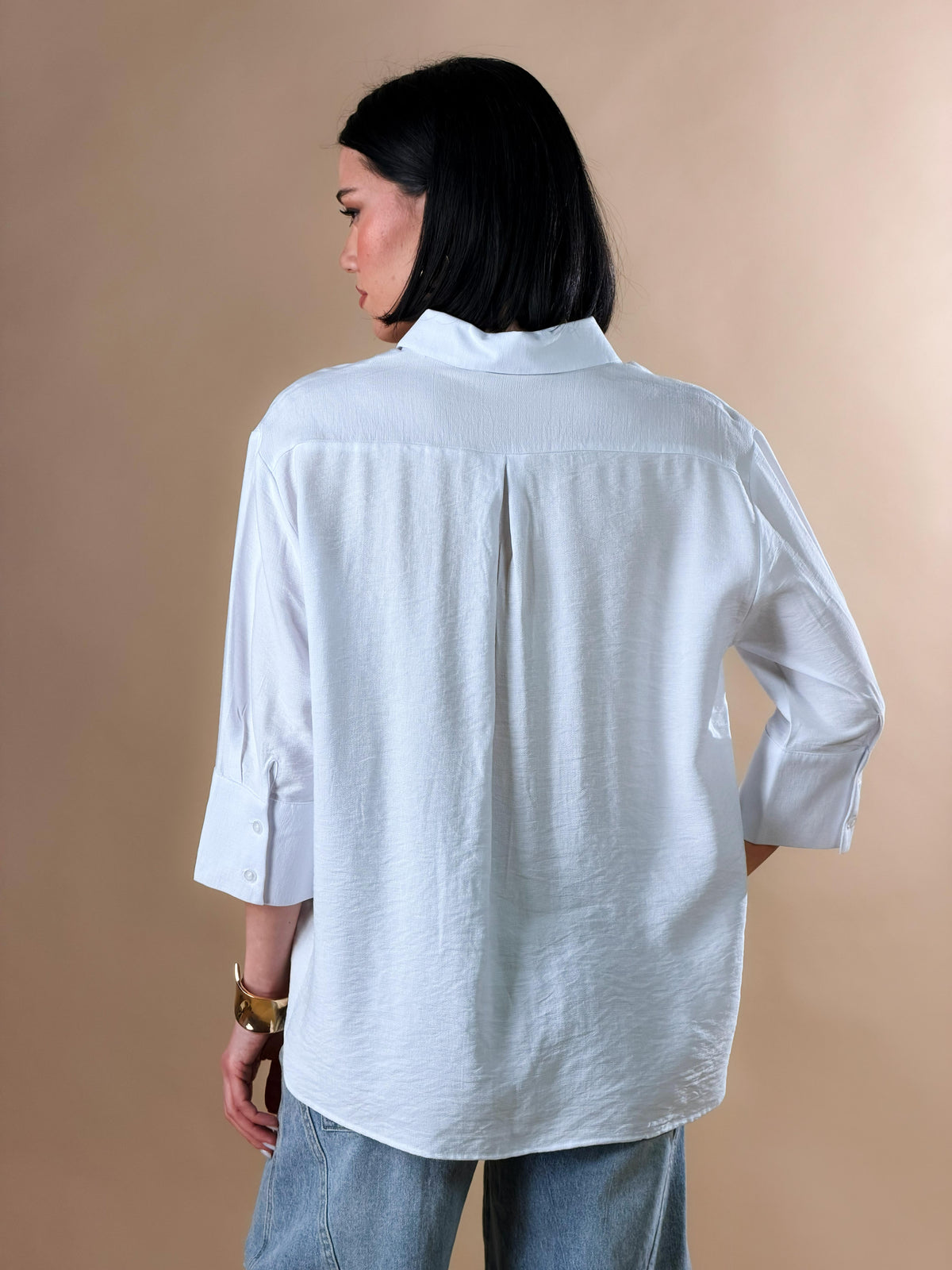 Celeste — Camisa con botones y mangas tres cuartos