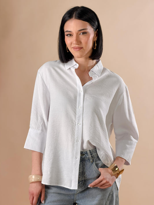 Celeste — Camisa con botones y mangas tres cuartos