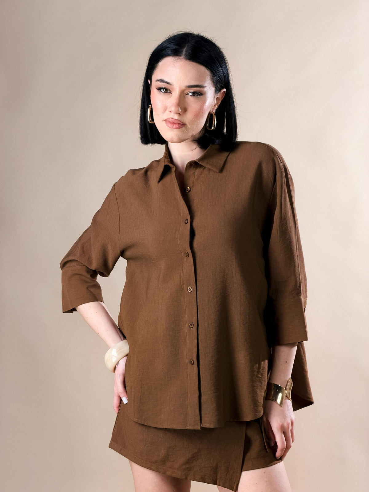 Celeste — Camisa con botones y mangas tres cuartos