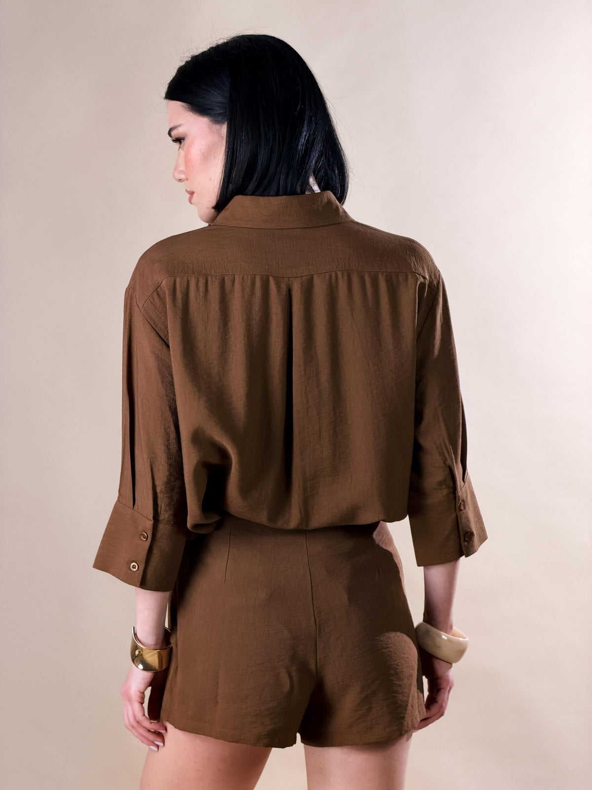 Celeste — Camisa con botones y mangas tres cuartos