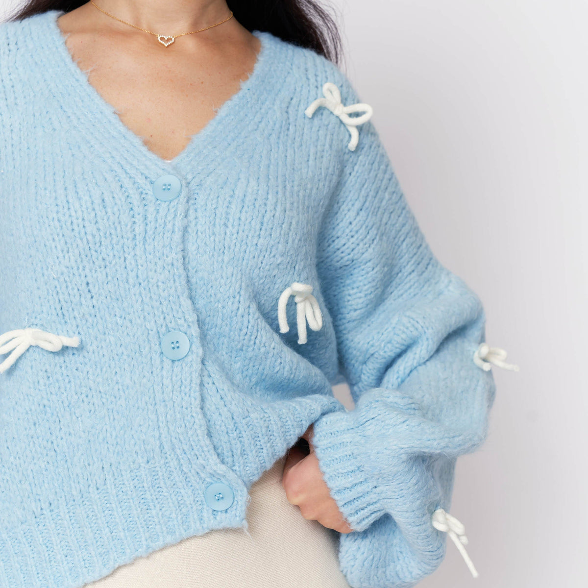 Aroa — Cárdigan holgado con mini lazos