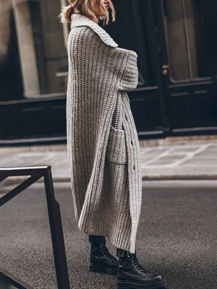 Ysabel — Jersey de punto largo oversized con cuello solapa y bolsillos
