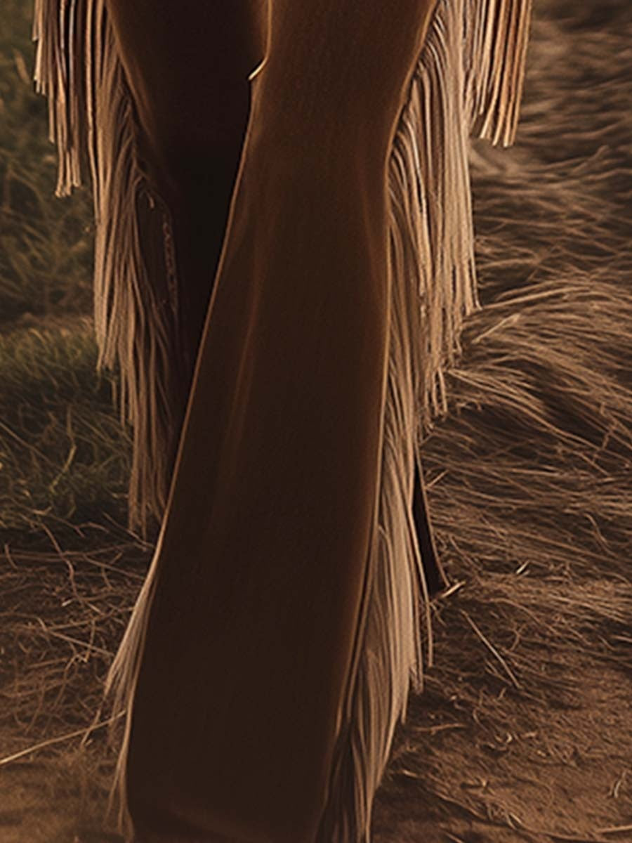 Evita — Pantalón vaquero campana con flecos de cintura alta