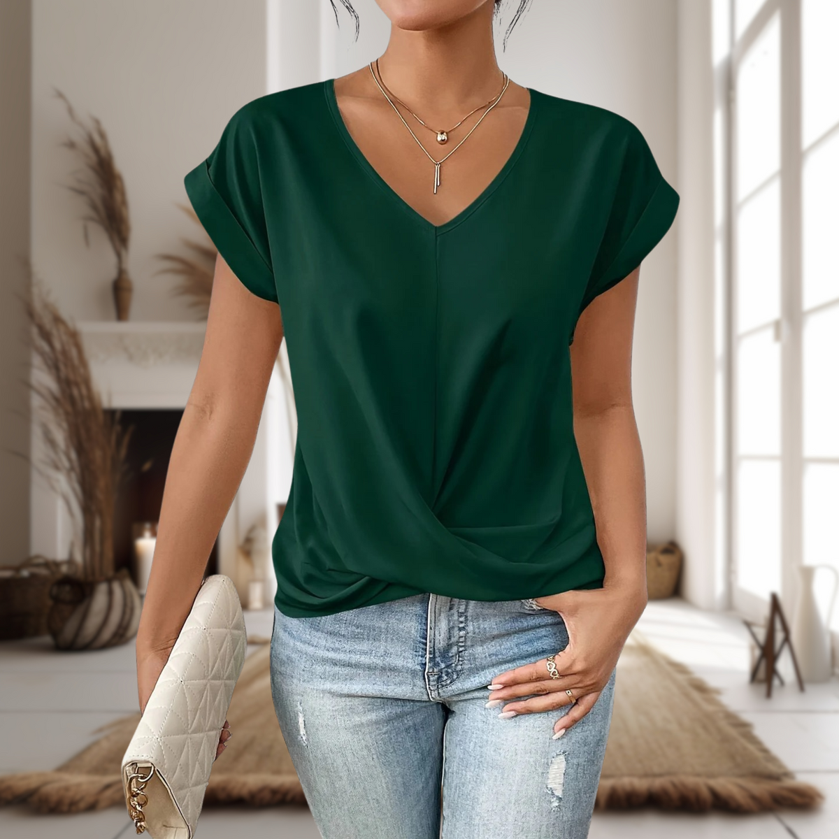 Maia — Blusa de manga corta con cuello en V y dobladillo cruzado
